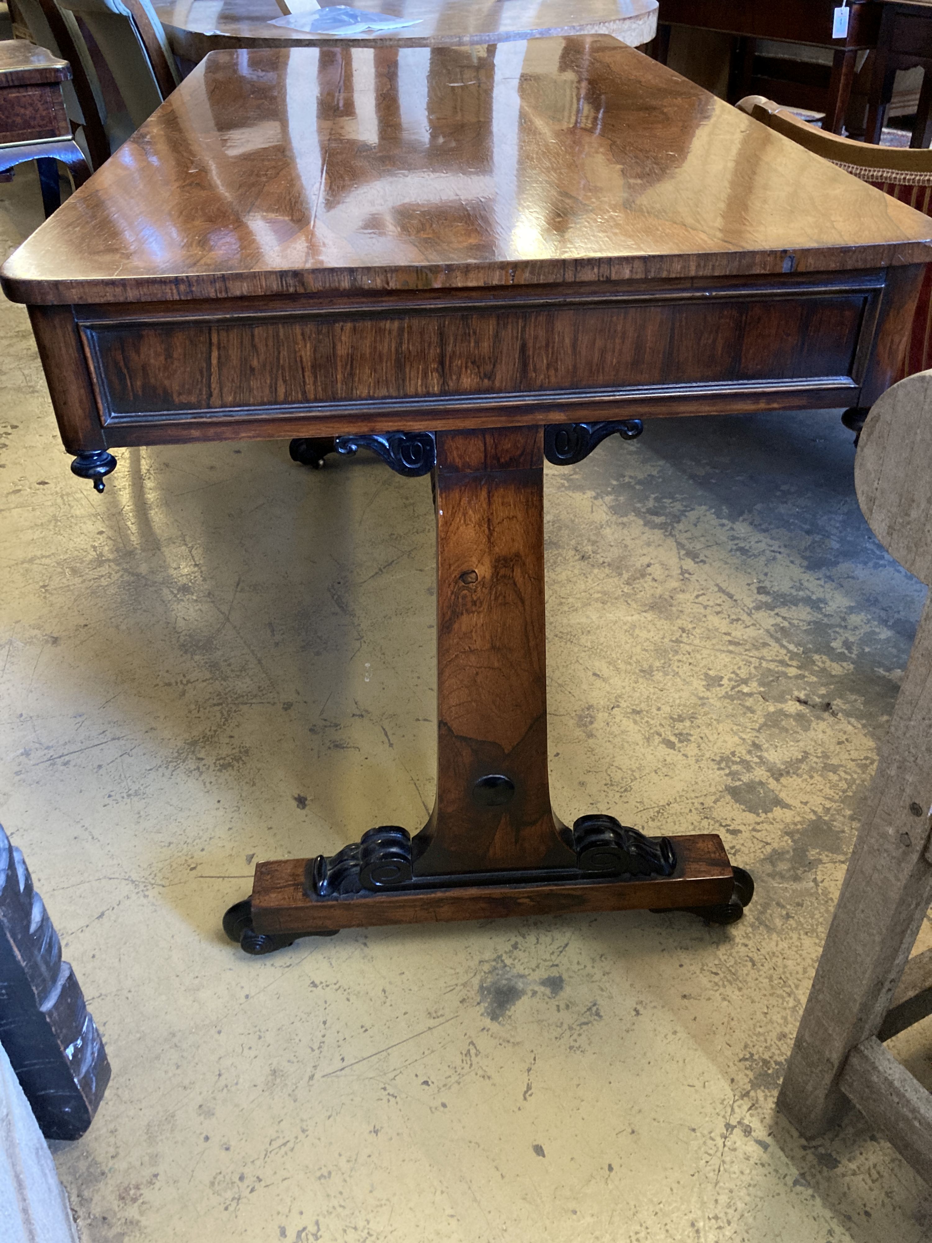 A Victorian rectangular rosewood two drawer library table, width 126cm, depth 66cm, height 76cm